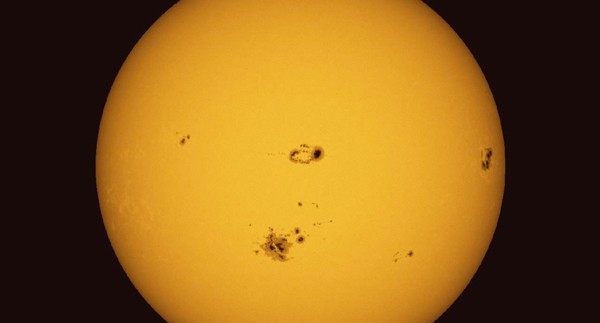Stanford researchers have found a way to detect sunspots such as these two days 