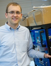 Marc Studer/UW Bothell    Seth Lyman of UW Bothell displays the Dual Channel Oxi