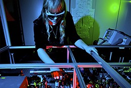 Researcher Helen Chrzanowski operates an experiment at The Australian National U