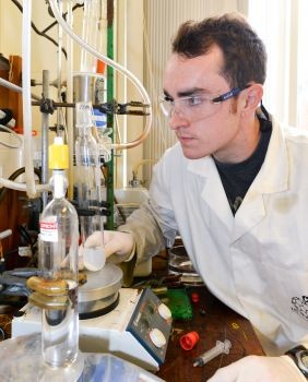 JRA student Melvyn Ansell at work in a chemistry laboratory