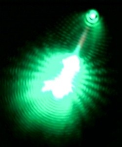 Laser light is emitted from the end of a cadmium sulfide nanowire.