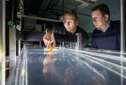 Dr Horst Punzmann (left) and  Michael Shats test their wave-generated tractor be