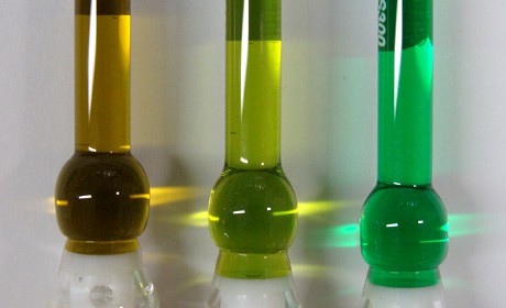 Solutions of the three metal carbene complexes of copper, silver and gold (left 