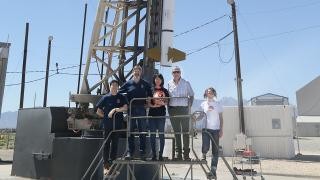 Some of the CLASP-II scientists pose for a photograph in front of the rocket at 