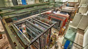 Unexpected antimatter asymmetry in the proton