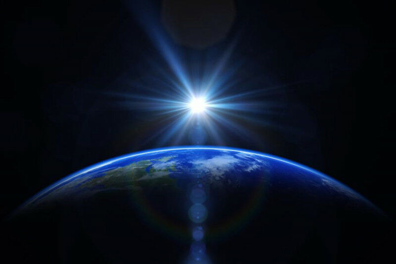 The sun&rsquo;s light shows the curvature of the Earth, as seen from space