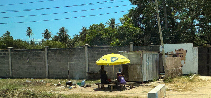 A littered cooking area in Dar es Salaam, Tanzania, where limited access to wast