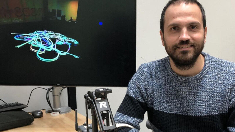 Gennaro Notomista, a University of Waterloo , with one of the robots that create