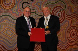 Professor Ian Chubb is presented with his certificate by Indiana University Pres