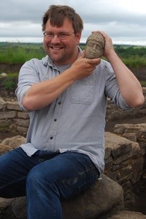 Dr David Petts on site with the Binchester head