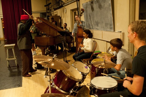 William Parker directs musicians in the Chocolate Heads movement band as they re