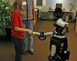 American Psychological Association    A study participant and Robovie shake hand