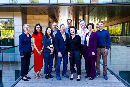 Tom and Margot Pritzker (center) and the organizing committee of the Conference 