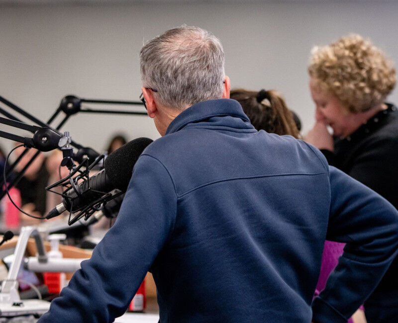 Mark Kenny faces student panel in background. Maria Taflaga and Jill Sheppard st