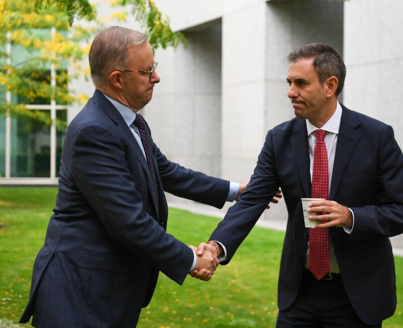 PM Anthony Albanese and Treasurer Jim Chalmers shake hands in Parliament House c