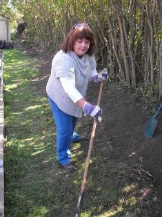 Avril Brown takes part in gardening team challenge