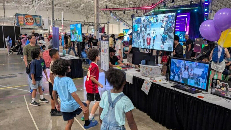 Children testing out games at CNE
