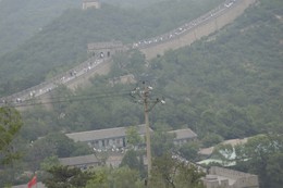 Electricity poles near the Great Wall of China by Nat W on Flikr.