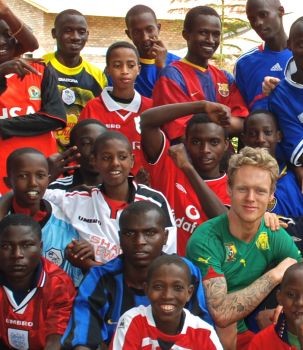 Nathan Green with his Rwandan footballers