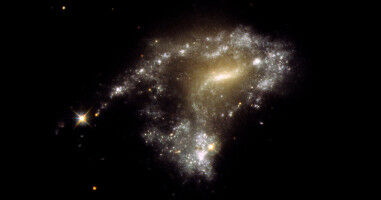 Hubble traces 'string of pearls' star clusters in galaxy collisions