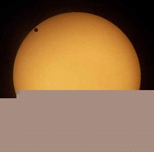 Just as Venus occasionally passes between Earth and the sun, distant planets occ