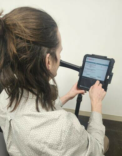 An individual fills out the PULSE Clinic survey. Dawn Smith