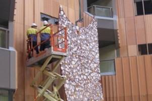 Life-size Yunupingu artwork delivered by crane