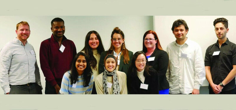 David Anderson, left, stands with graduate student recipients of the 2023 Presid