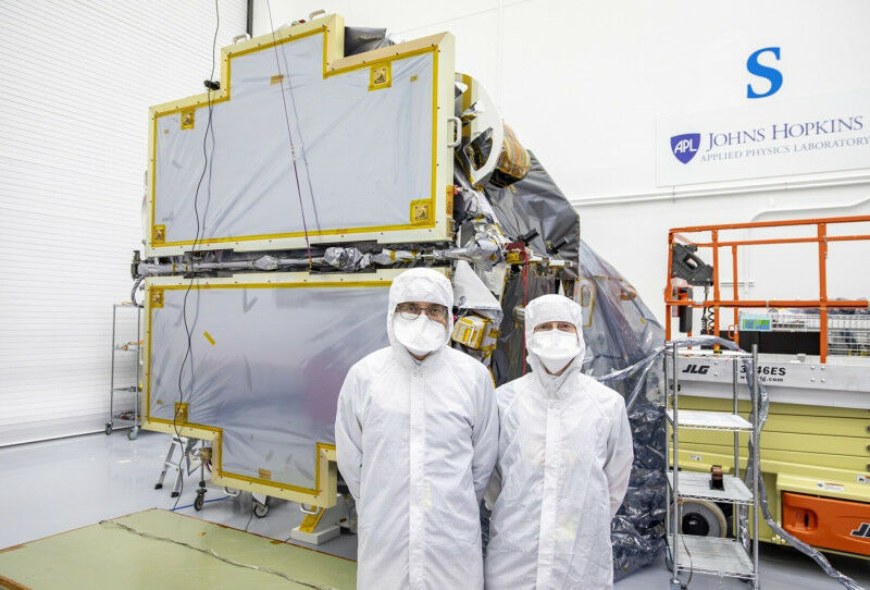 Tim (L) and Helen (R) in the assembly clean room with the spacecraft