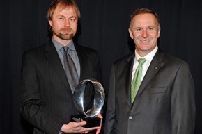 Dr Strzepek (left) receives his award from New Zealand Prime Minister John Key.