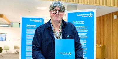 Poet Laureate marks cancer research progress