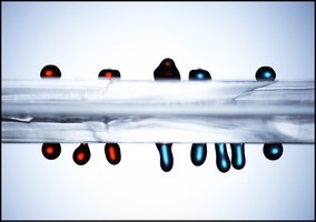 Karl Bohringer, UW    Drops of red and blue liquid move along the upper and lowe