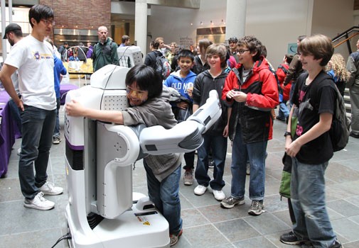 College of Engineering Dean&rsquo;s Office  A student gets a hug from the next-g