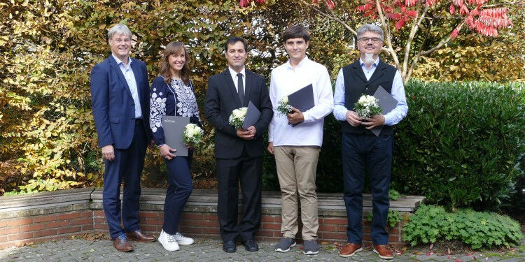 Vice-Rector Michael Quante together with the fellows: Dr. Dariia Opryshko, Dr. E