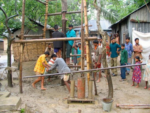 Drilling a deep well in rural Bangladesh to tap into arsenic-free water.