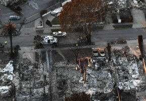 Smouldering materials cause toxic fumes as LA wildfires damp down