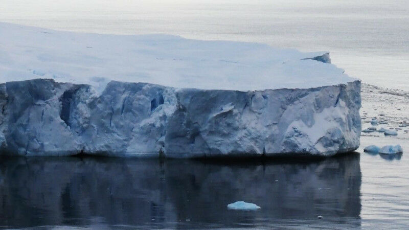 glacier visible on top of the water in Antarctica