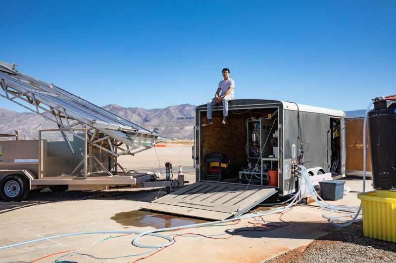 Jon Bessette sits atop a trailer housing the electrodialysis desalination system