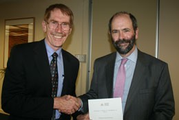 Vice-Chancellor   Ian Young presents the highest domestic profile award to   Don