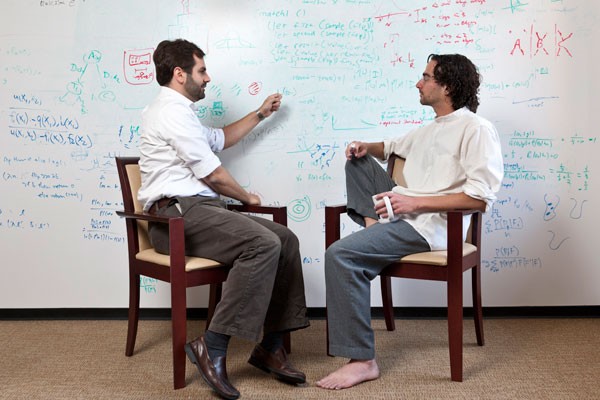 Noah Goodman, right, and Michael Frank, both assistant  s of psychology, discuss