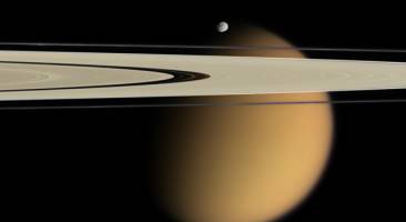 Surprise Hidden in Titan's Smog: Cirrus-Like Clouds