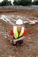 Swim coach has a hole lot of love for the city's newest pool