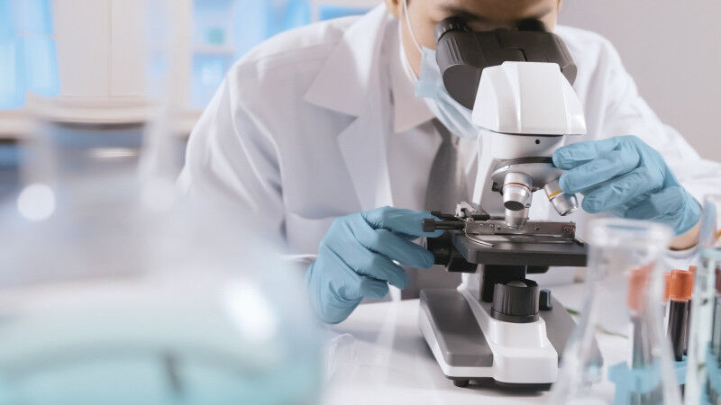 Asian-scientist-doing-some-research-and-looking-th-2025-02-22-15-10-47-utc (1) A