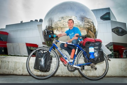 Chris Gruar at ANU near the end of his 45,000km ride from London to Sydney. Phot