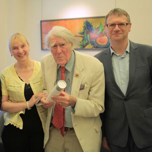 Captain Roberts with  Susanne Kord and  Jonathan Wolff in
2013, receiving his UC