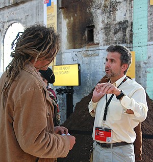 John Crawford (right) discussing his work at the recent TEDxSydney 2012.
