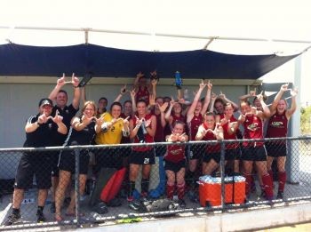 Goal keeper Roseanne Thomas (in yellow) celebrates with the rest of the Welsh na