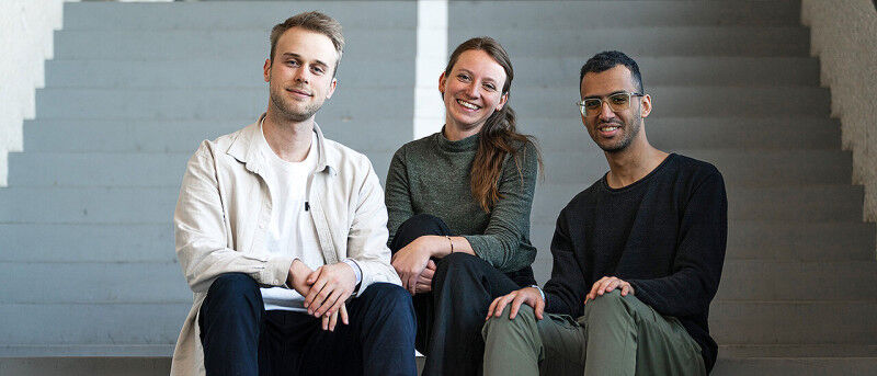Fabian Schlausch, Svenja Fischer, and Abdullah Abdelrazek (from left) support pu